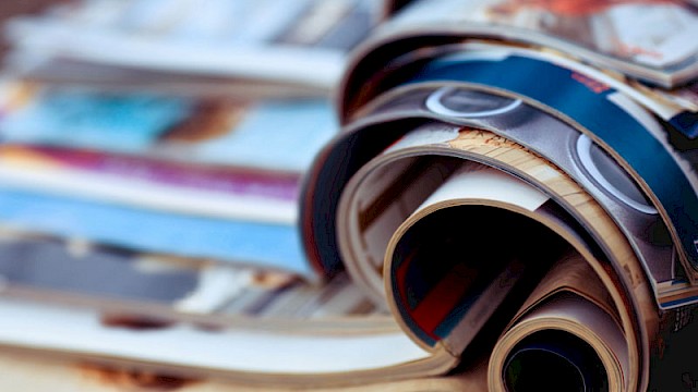 Stack of opened magazines